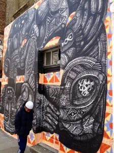 muslim boy in front of wall