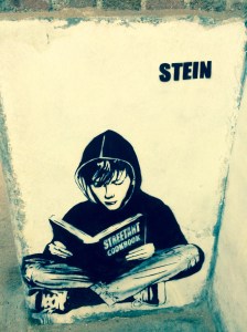 streetart reading boy