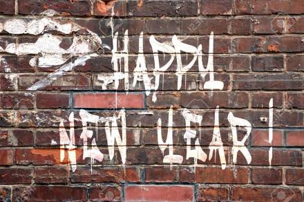 Happy new Year on a brick wall, street-art style